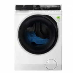 Valkoinen edestä täytettävä pesukone, jossa on musta pyöreä ovi ja musta ohjauspaneeli, rummussa on sininen vaate.